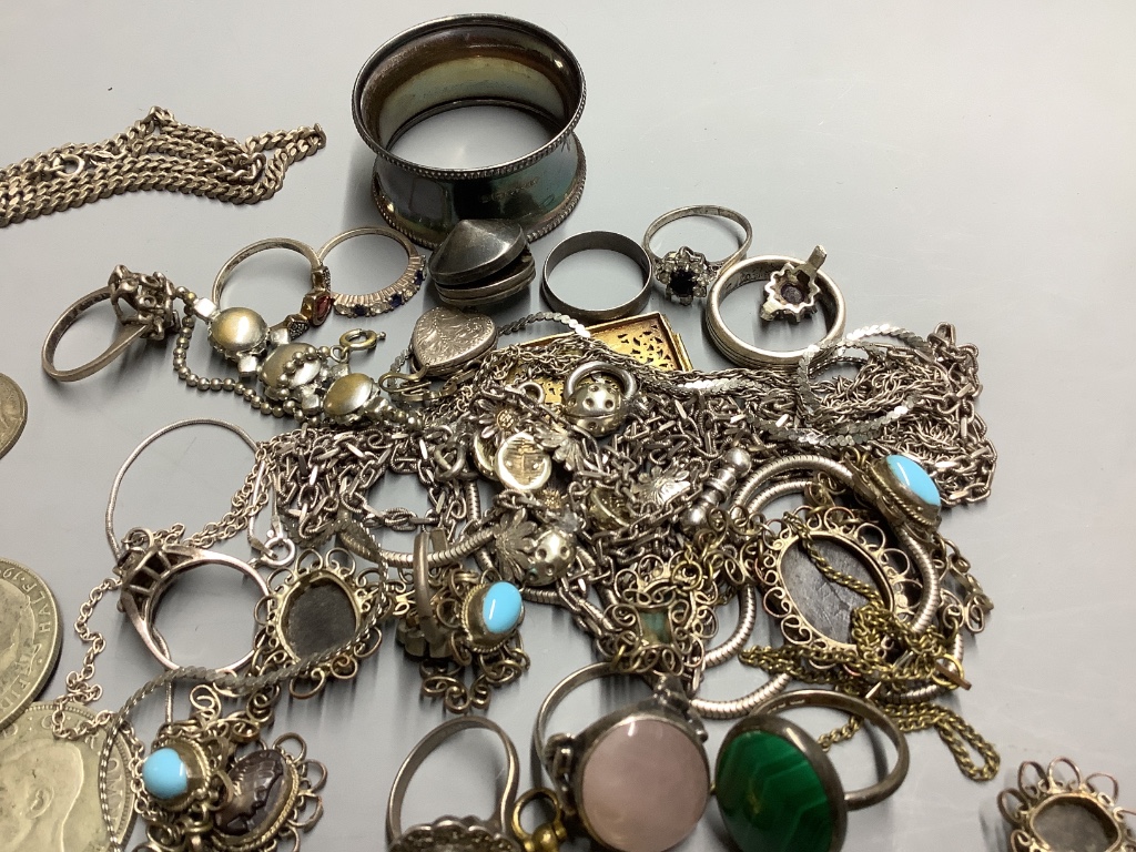 A group of mixed costume jewellery and other items including silver napkin ring.